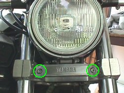 Description : http://maxijoe.free.fr/Furbur/Alternative_headlight_removal.jpg